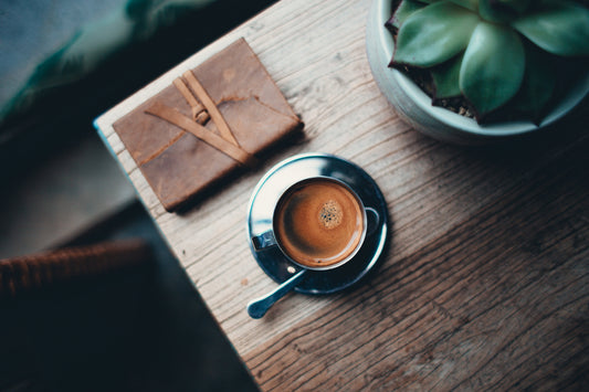 journal-and-coffee-at-table