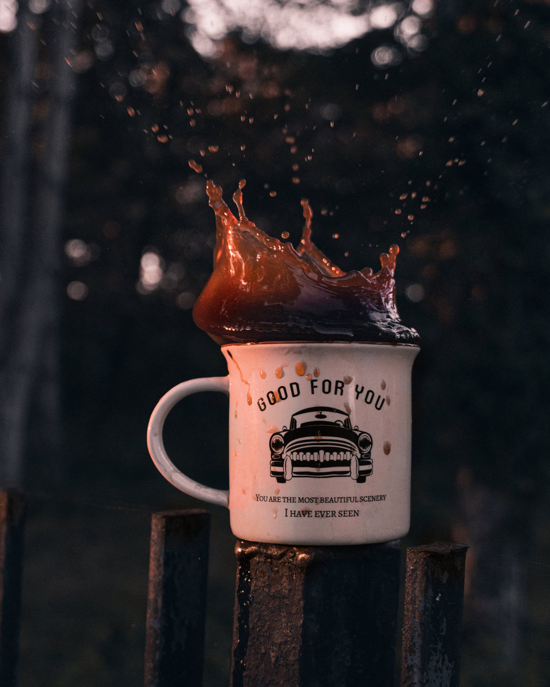 white-mug-with-coffee-splashing-out-of-it